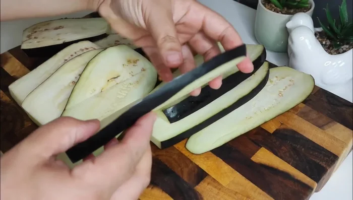 Prepare the eggplant: Wash, peel (optional), and slice the eggplant into rounds or your preferred shape.