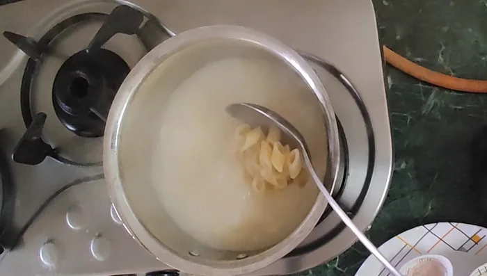 Drain the cooked pasta.