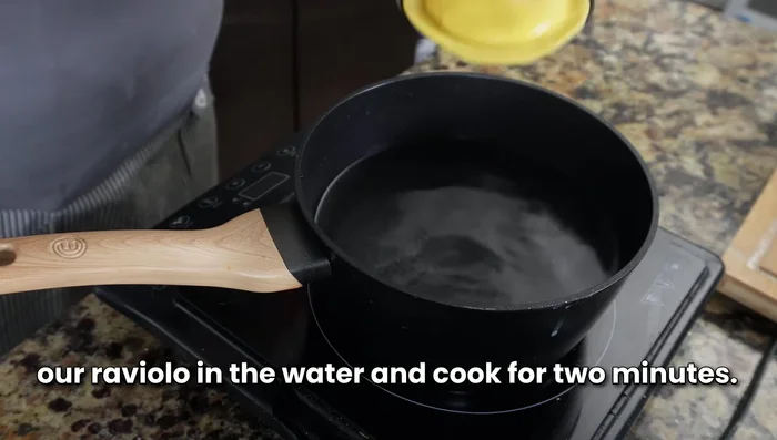 Cook the ravioli in boiling water for 2 minutes.
