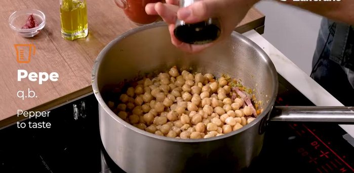 Add tomato puree to the mixture and let it simmer for 15 minutes.