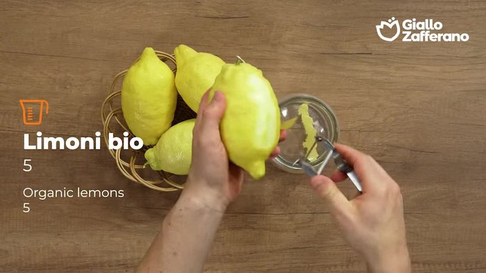 Peel the lemons using a potato peeler, ensuring you only get the yellow part to avoid bitterness.