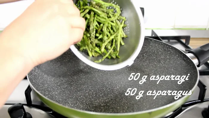 Boil 200g potatoes. While potatoes cook, sauté 50g asparagus with garlic, salt, and oil.