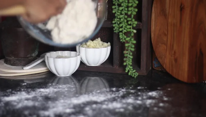 Dust your work surface with flour and knead the dough for about 10-13 minutes, or until soft, smooth, and elastic. (If using a stand mixer with a dough hook, knead on medium speed for about 8 minutes).