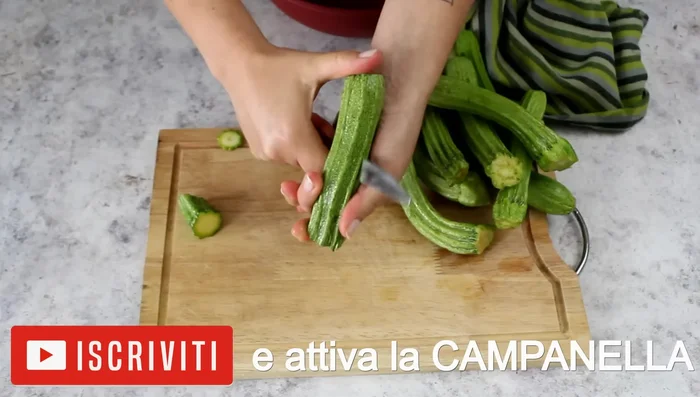 Cook the courgettes: Add the courgettes, salt, and pepper to the pan. Cook over low heat until soft and slightly golden, without adding water.