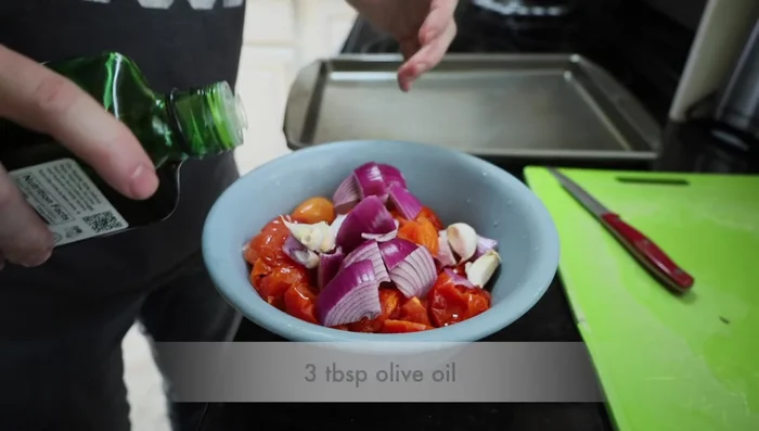 Drizzle 3 tablespoons of olive oil over the mixture and toss to coat.