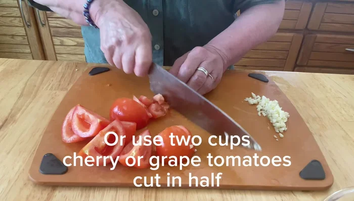 Chop the tomatoes (or halve grape/cherry tomatoes).
