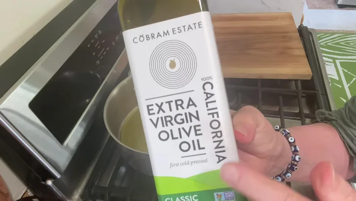 Heat olive oil in a Dutch oven. Test with eggplant to ensure oil is hot enough for searing.