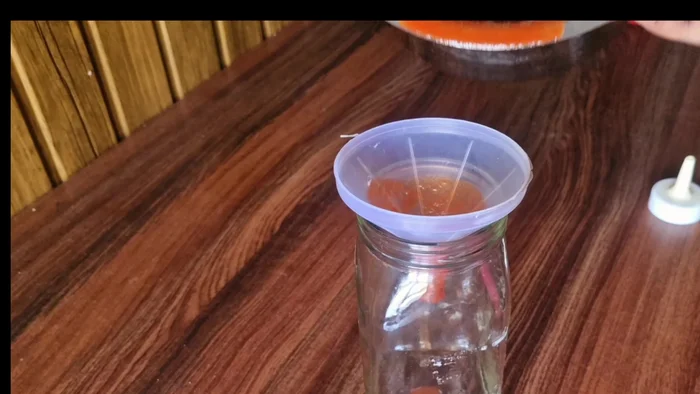 Let the sauce cool completely before transferring it into sterilized glass bottles or jars.