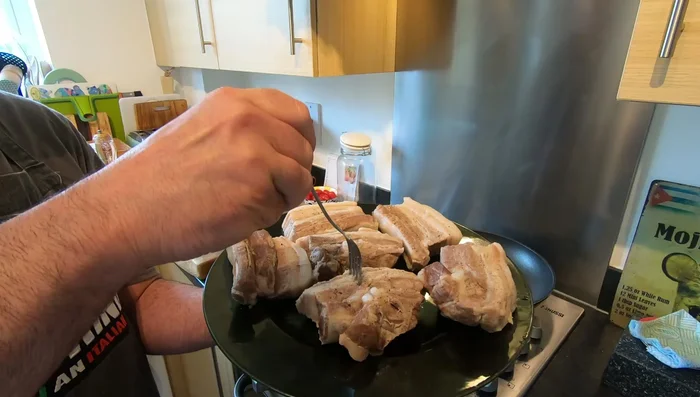 Boil the pork ribs for approximately 45 minutes until tender (a fork should go in easily but not completely).
