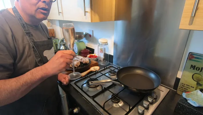 Brown the pork ribs in a pan with olive oil for 3-4 minutes per side.