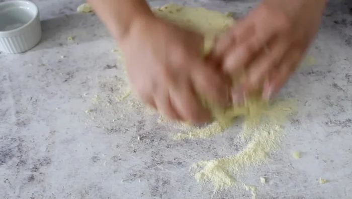 Add salt and additional flour as needed, continuing to knead.