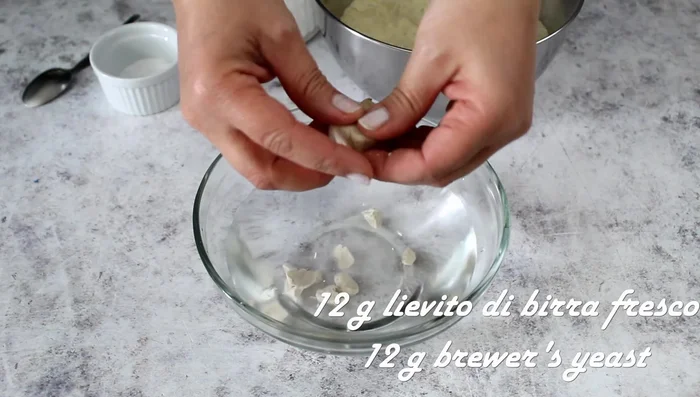 Dissolve yeast, sugar in lukewarm water (30-35°C).