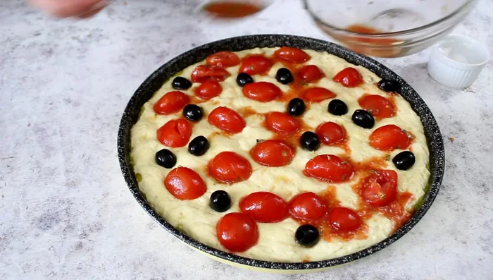 Drizzle with olive oil and sprinkle with oregano and salt.