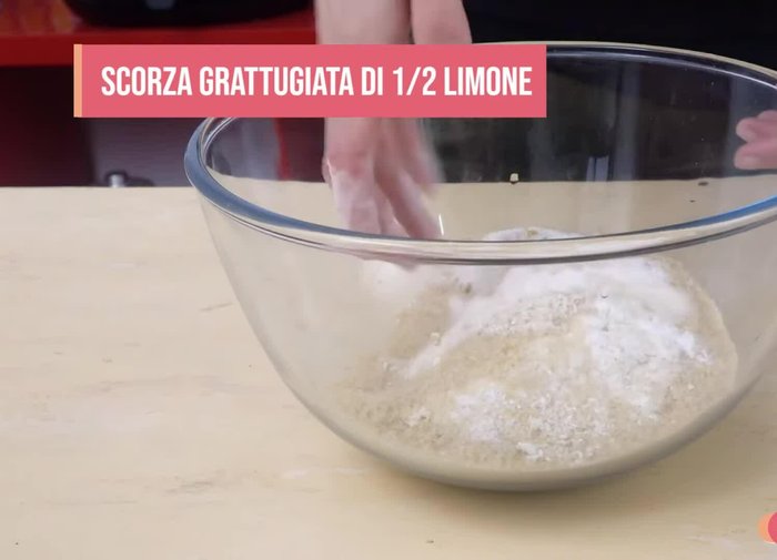 Add 1 egg, zest of ½ lemon, and 80g butter (in pieces) to the bowl.