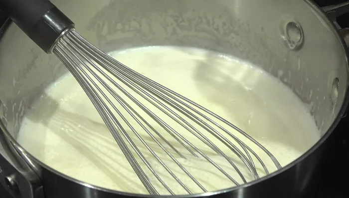 Add seasonings: 2 teaspoons garlic, 1/2 teaspoon Italian herbs, 1/2 teaspoon kosher salt, 4 teaspoons black pepper, 1 teaspoon truffle zest, and 1 teaspoon truffle pate. Whisk until well combined. (90.799)