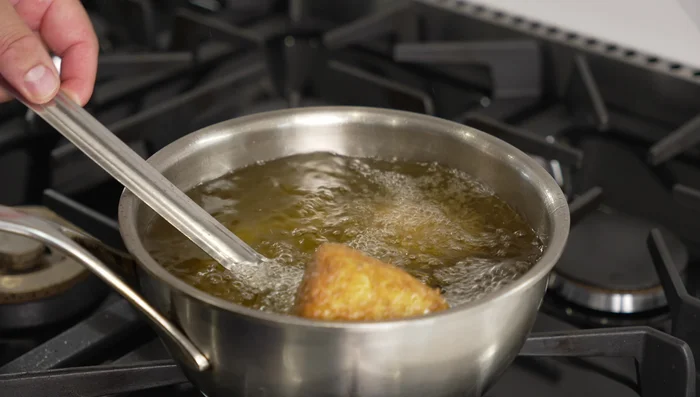Fry the Arancini: Fry in oil at 320°F (160°C) for 4-5 minutes until golden brown and the cheese is melted.