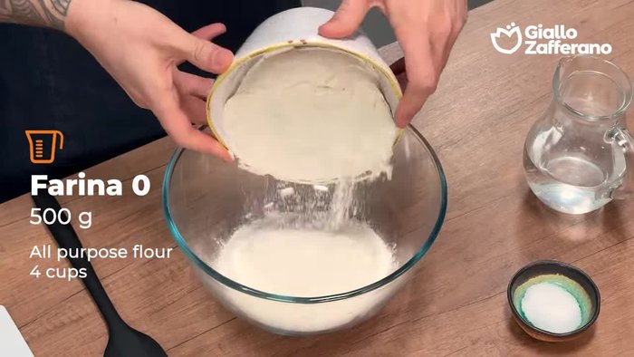 Add salt, baking powder (not yeast), and oil. Mix with a spatula or wooden spoon.