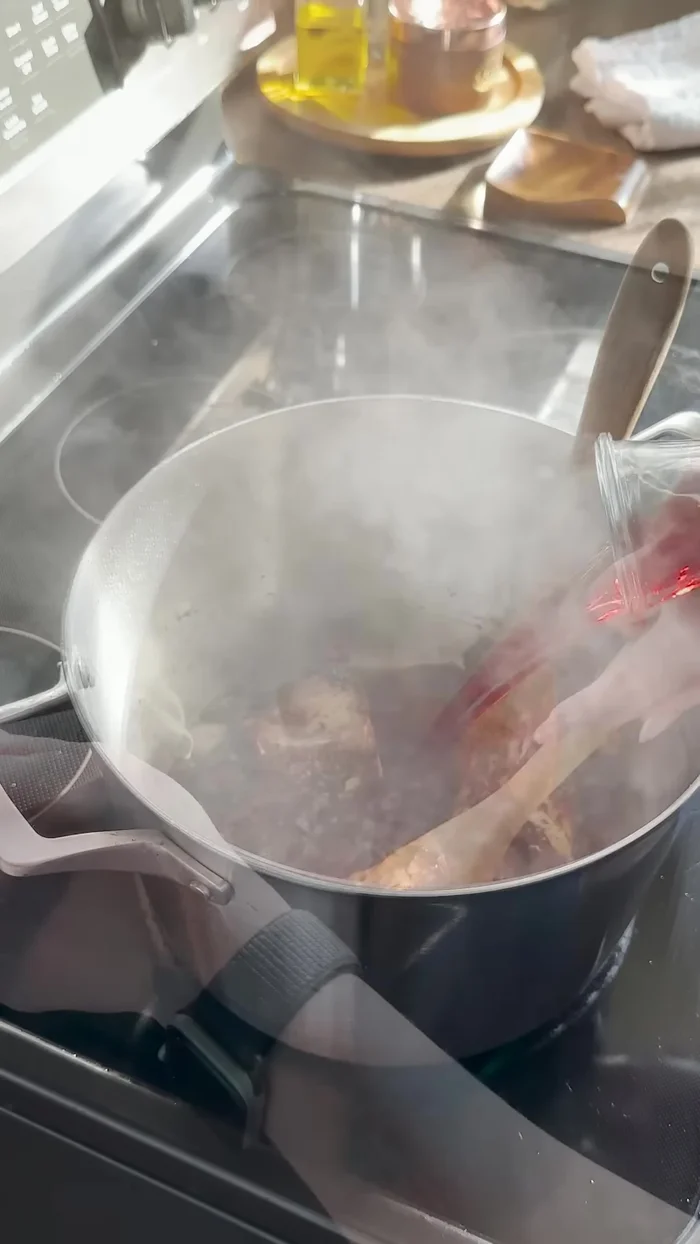 Add canned tomato paste and cook until melted.