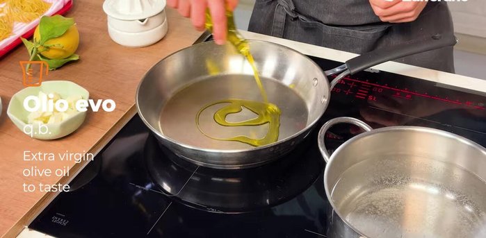 Prepare the lemon dressing: Heat olive oil and a few cubes of butter. Add thyme leaves and lemon zest. Cook over low heat until fragrant.