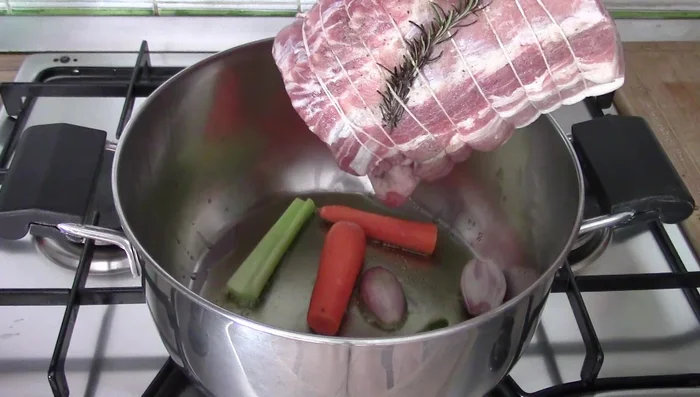 Add the pork loin to the hot oil and brown on all sides.