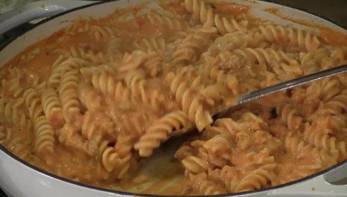 Toss cooked pasta with the sauce and serve.