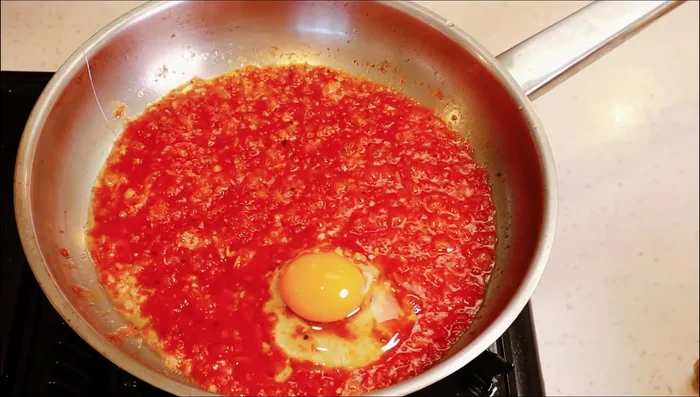 Cover the pan to cook the eggs, about 10-15 seconds. Check to avoid overcooking the yolks.