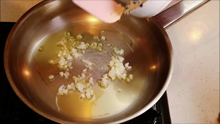 Add 1/4 of a diced onion and fry until softened.