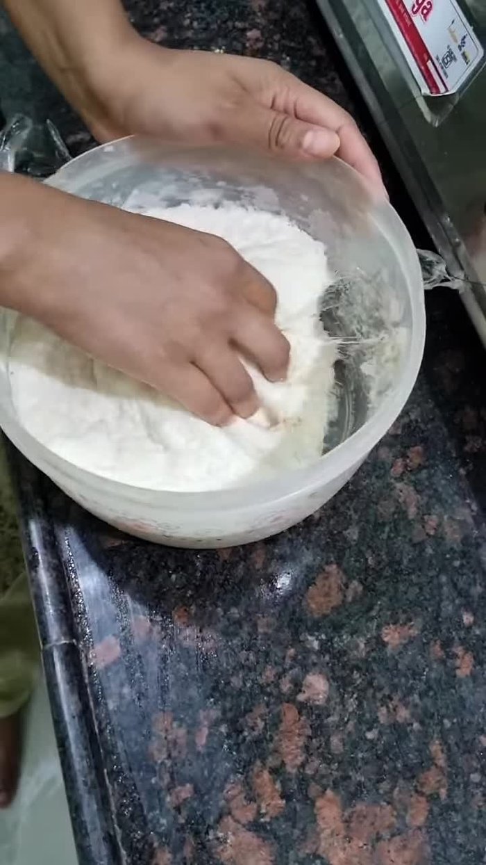 Start with the dough making process using yeast.