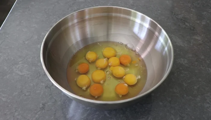 Whisk eggs with salt. Add milk (carefully, to prevent splattering).