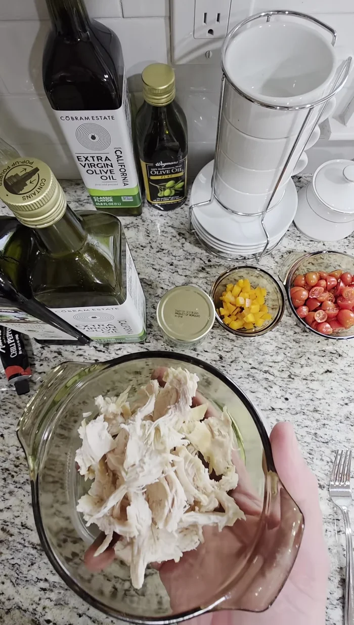 Prepare the chicken: Use pre-cooked white breast meat from a rotisserie chicken.