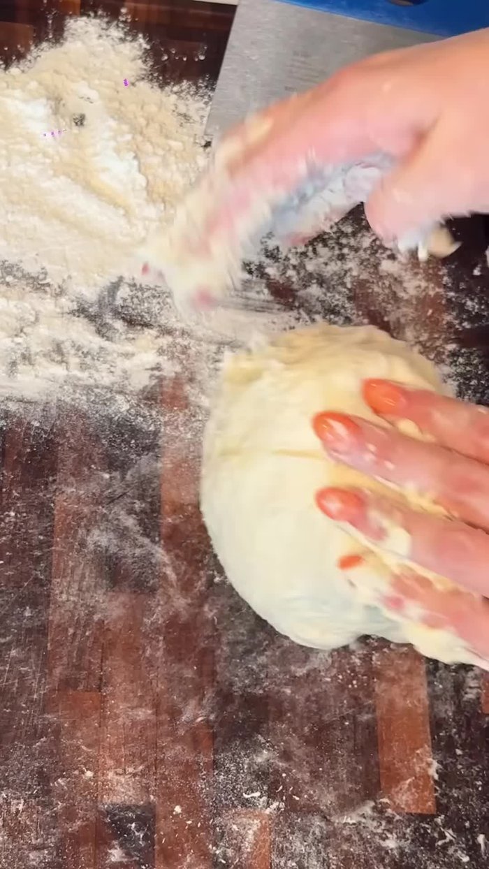 Transfer dough to an oiled bowl, cover, and let rise in a warm place for about an hour.