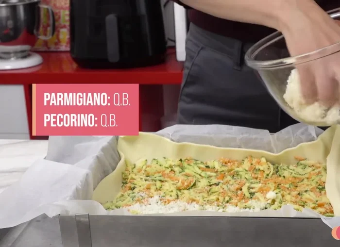 Sprinkle the top with extra parmesan, pecorino, and oregano.