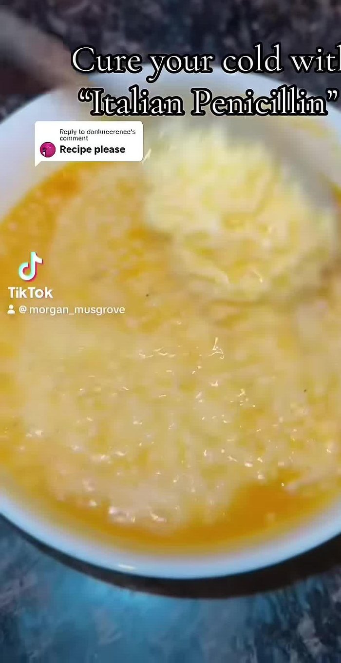 Combine onion, garlic, carrots, celery, chicken broth, water, chicken bouillon cube, bay leaf, parmesan rind, and turmeric in a pot. Bring to a boil, then cover and simmer for 30 minutes.