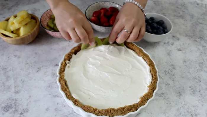 Decorate the chilled tart with your favorite fresh fruits.