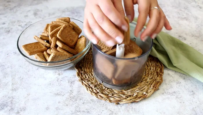 Blend 300g of dry biscuits (digestives).