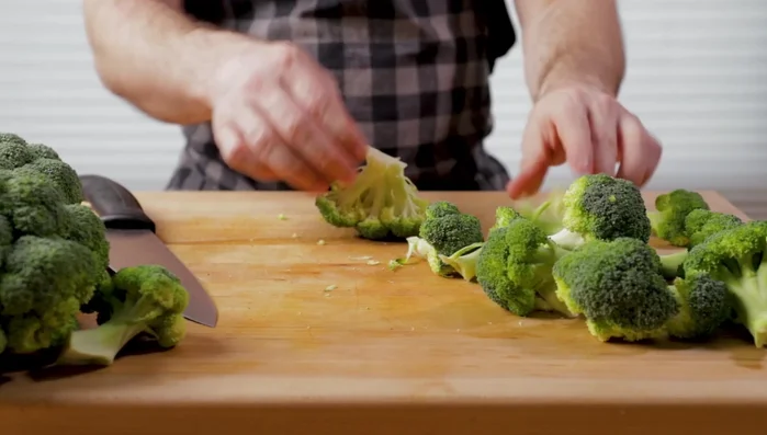 Remove broccoli florets from the heads and cut off the tough ends, ensuring roughly uniform sizes for even cooking.