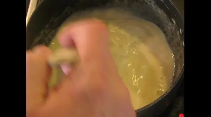 Add milk and turn up the heat slightly (milk doesn't need preheating).