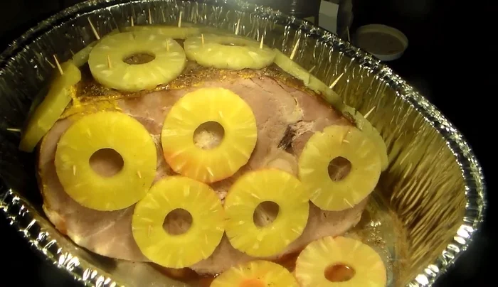 Place cherries in the holes made by the pineapples, securing them with toothpicks.
