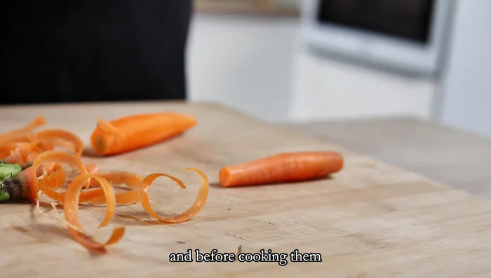 While vegetables are baking, prepare caramelized carrots: Peel baby carrots. Cook in boiling salted water until tender.