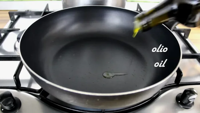 Sauté the aubergine: Heat 3 spoons of olive oil in a pan until hot. Add the aubergine, salt, and cook until golden brown.