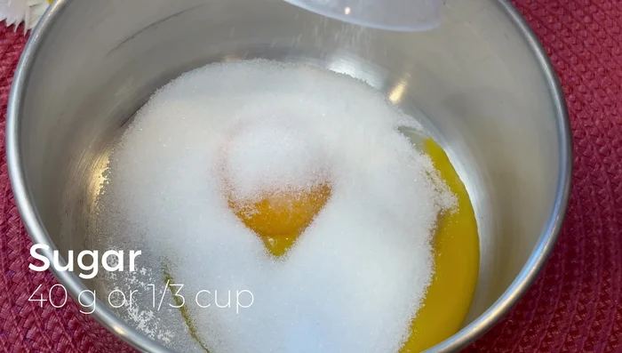 Make the lemon curd: In a small pan, whisk together egg yolks, sugar, and a pinch of salt.