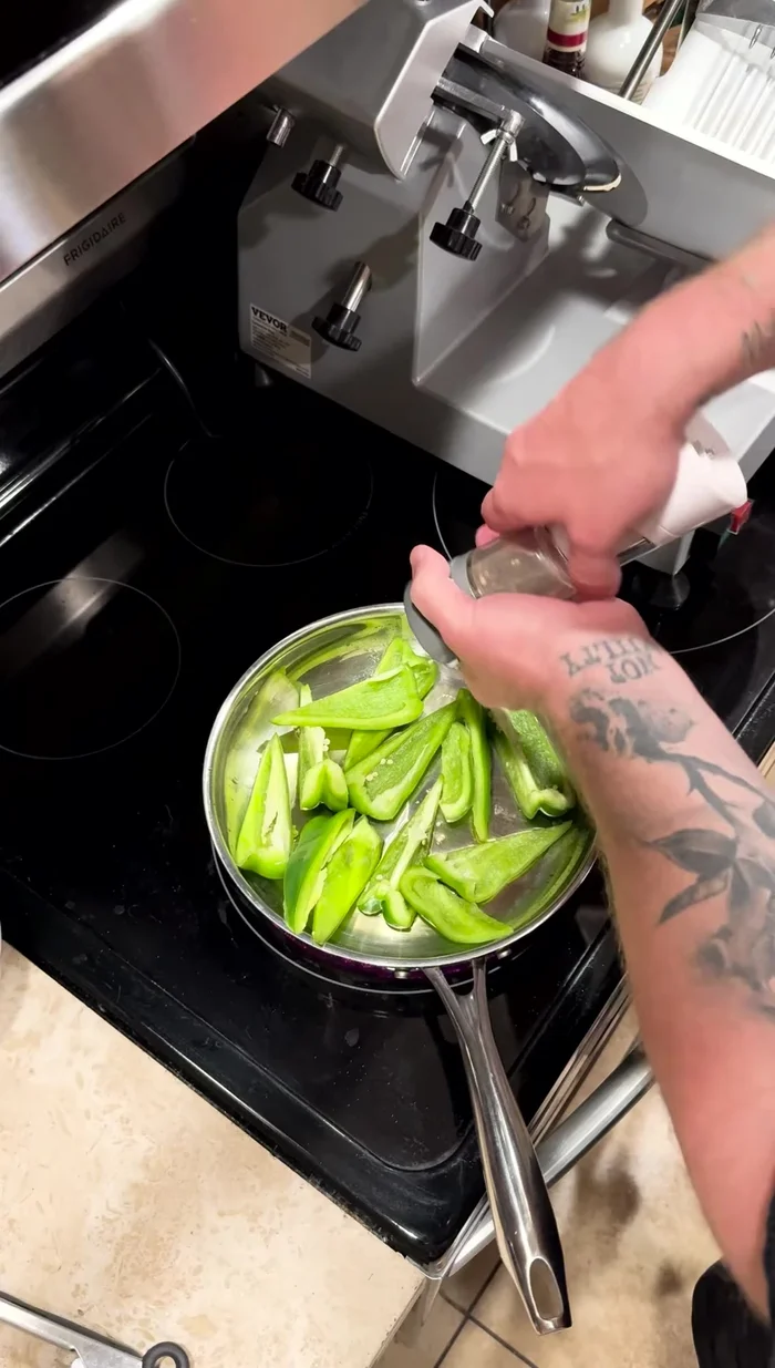 Sauté bell peppers with salt and pepper until soft.