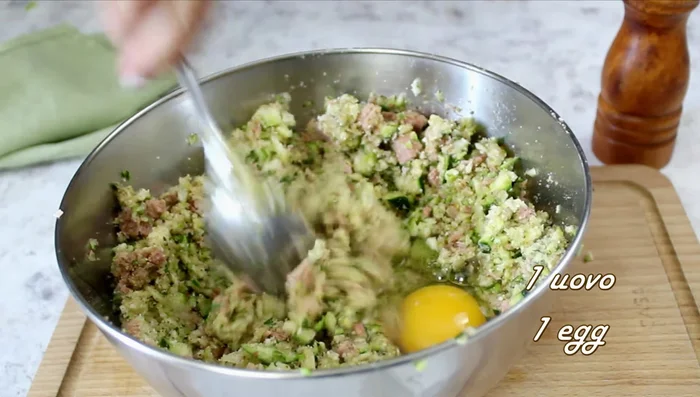 Add one egg and mix until well combined.