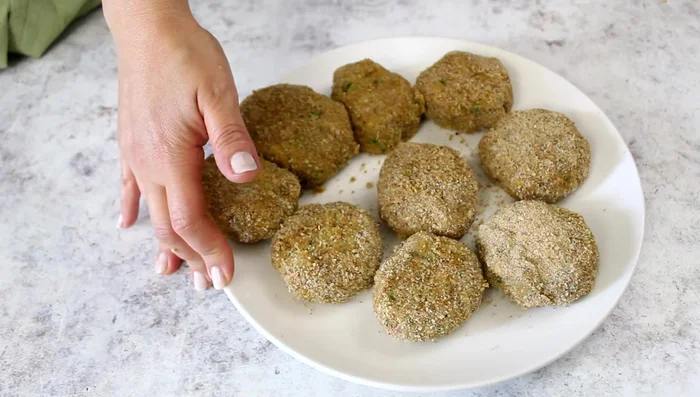 Heat oil in a pan (approx. 300ml) and fry the meatballs in batches for 3-4 minutes per side, until golden brown.