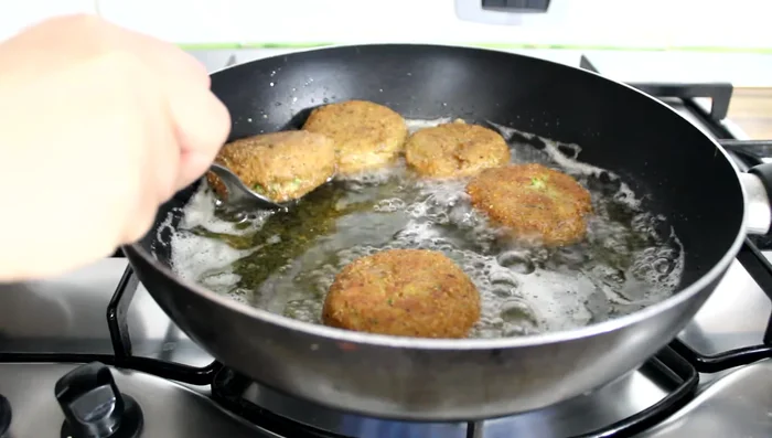 Remove meatballs and place on absorbent paper to drain excess oil.