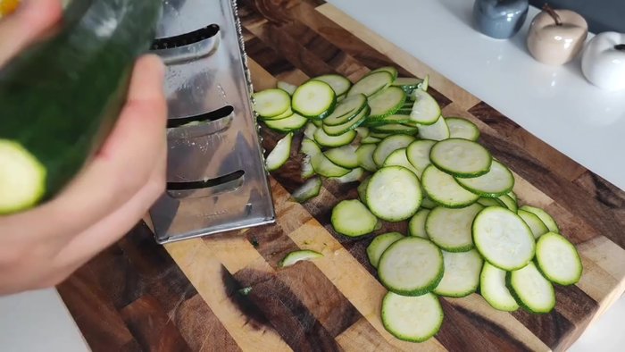 Start preparing the zucchini. (Details missing from transcript)