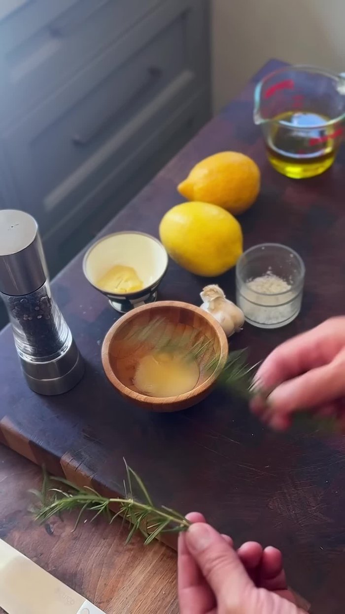 Grab a rosemary sprig and remove it from the stem. Chop it into small pieces.