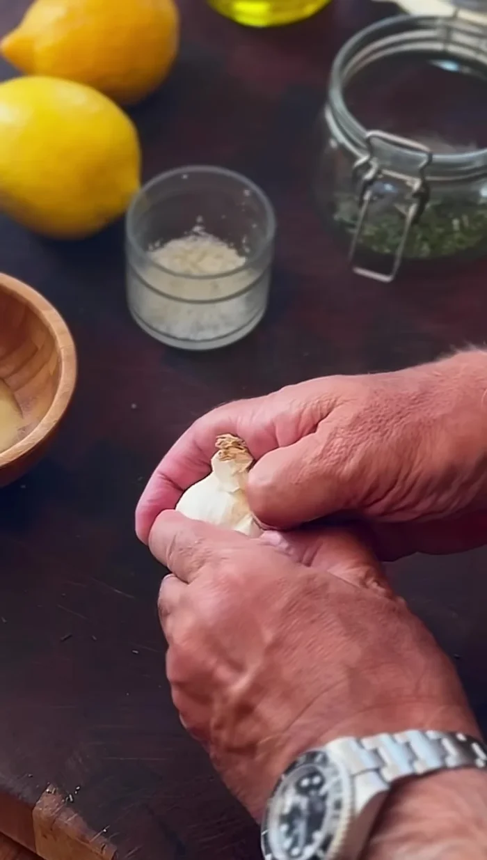 Cut one garlic clove into three pieces, then finely mince it. Add it to the jar.
