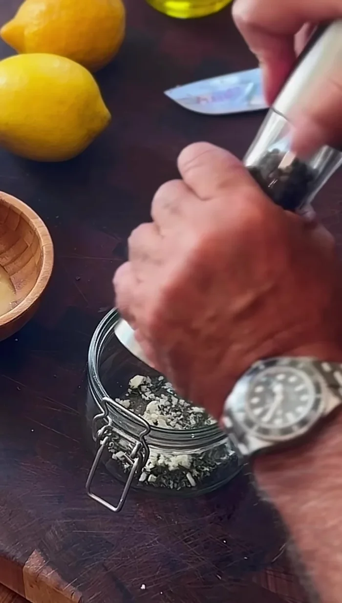 Add 1 tablespoon of honey and 1 tablespoon of Dijon mustard to the jar.