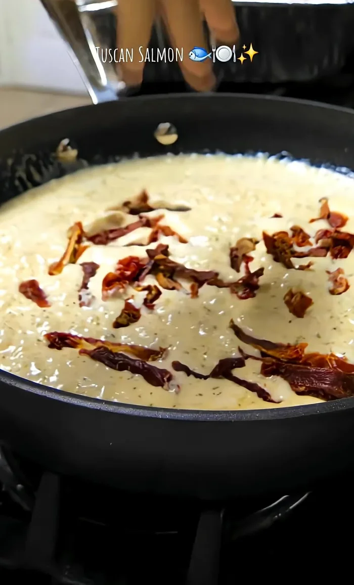 Add sundried tomatoes and spinach to the sauce; let wilt down and mix.